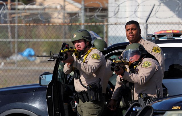 Members of law enforcement operate amidst a standoff between police and protesters following multiple detentions by Immigration and Customs Enforcement (ICE), in the Los Angeles County city of Compton, California, U.S., June 7, 2025. (Photo by Daniel Cole/Reuters)