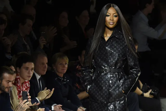 British model Naomi Campbell presents a creation for Louis Vuitton during the men' s Fashion Week for the Fall/ Winter 2018/2019 collection in Paris on Janaury 17, 2018. (Photo by Bertrand Guay/AFP Photo)