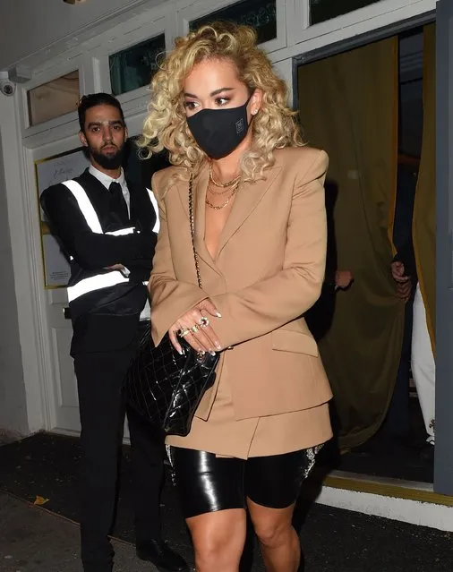 English singer Rita Ora, 29, looked incredible as she enjoyed a night out with pals in North London on September 18, 2020. The risqué model teamed the outfit with a camel blazer and nothing underneath. (Photo by Instagram/The Sun)