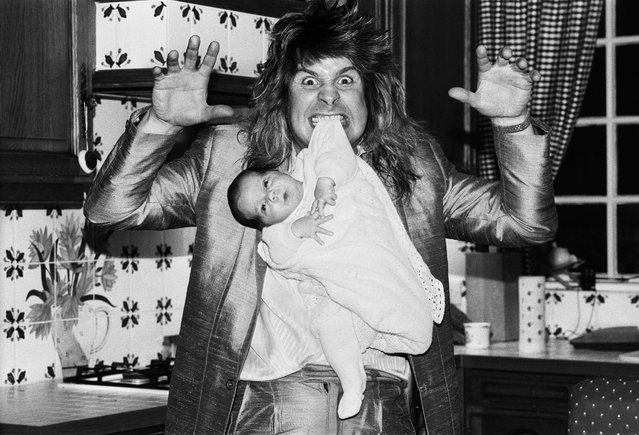 British rock singer, musician, one of the founders and member of the band Black Sabbath, which had a significant influence on the emergence of such musical styles as hard rock and heavy metal Ozzy Osbourne, pictured at home two weeks after the birth of his baby boy Jack. 25th November 1985. The heavy metal star, who fronted Black Sabbath before a long solo career, has died aged 76 in Birmingham, UK on July 22, 2025. (Photo by Mike Maloney/Mirrorpix via Getty Images)