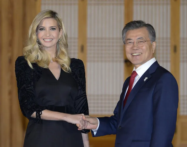 South Korean President Moon Jae-in shakes hands with Ivanka Trump during their dinner at the Presidential Blue House on Friday, February 23, 2018, Seoul, South Korea. Ivanka Trump has received a red-carpet welcome in South Korea as head of the U.S. delegation to this weekend's closing ceremony for the Winter Olympics in Pyeongchang. (Photo by Kim Min-Hee/Pool Photo via AP Photo)