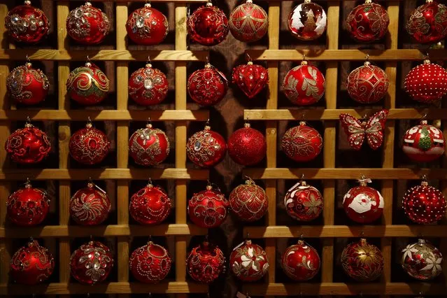 Glass baubles Christmas decorations are displayed at the Silverado manufacture of hand-blown Christmas ornaments in the town of Jozefow outside Warsaw December 2, 2014. (Photo by Kacper Pempel/Reuters)