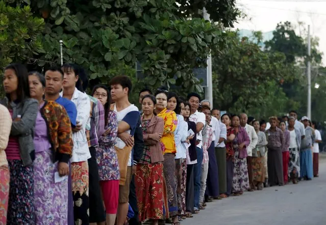 People queue up to vote during the general election in Mandalay, Myanmar, November 8, 2015. (Photo by Olivia Harris/Reuters)