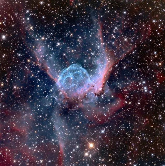 Thor’s Helmet (NGC 2359). The distinctive shape of the nebula NGC 2359 has led to it also being known as Thor’s Helmet, as it resembles the headgear of the Norse God (and Marvel superhero). Around 11,000 light years away, the overall bubble shape is mainly due to interstellar material swept up by the winds of the nebula’s central star, Wolf-Rayet, an extremely hot giant thought to be in a pre-supernova stage. (Photo by Adam Block)