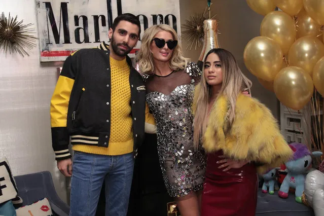 (L-R) Phillip Picardi, Paris Hilton, and Ally Brooke attend the Paris Hilton X Beautycon Festival NYC Pre-Party on April 20, 2018 in New York City. (Photo by Cindy Ord/Getty Images for Beautycon)