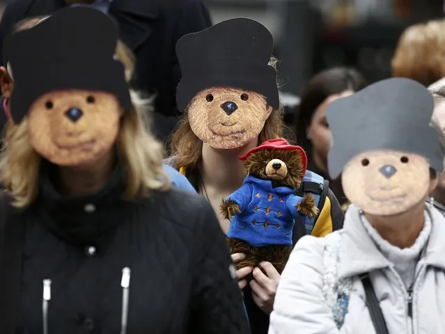 Demonstrators wear Paddington Bear masks during a protest highlighting the plight of child refugees, outside the Home Office in London, Britain October 24, 2016. (Photo by Peter Nicholls/Reuters)