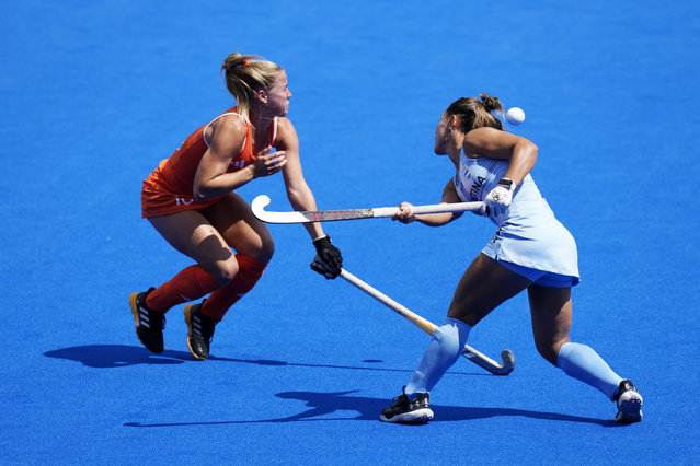 Netherlands' Joosje Burg, left, reacts after Argentina's Agustina Gorzelany's stick catches her on the face during the women's semifinal field hockey match between Argentina and Netherlands at the Yves-du-Manoir Stadium during the 2024 Summer Olympics, Wednesday, August 7, 2024, in Colombes, France. (Photo by Aijaz Rahi/AP Photo)