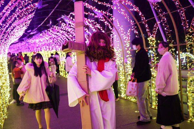 A person dresses up as Jesus at a Christmas theme park in New Taipei City, Taiwan, on December 25, 2024. (Photo by Ann Wang/Reuters)