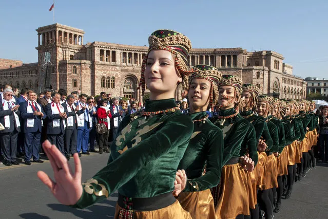 Armenian women dance in central Yerevan on October 12, 2014 during celebrations to mark Yerevan's city day. (Photo by Karen Minasyan/AFP Photo)