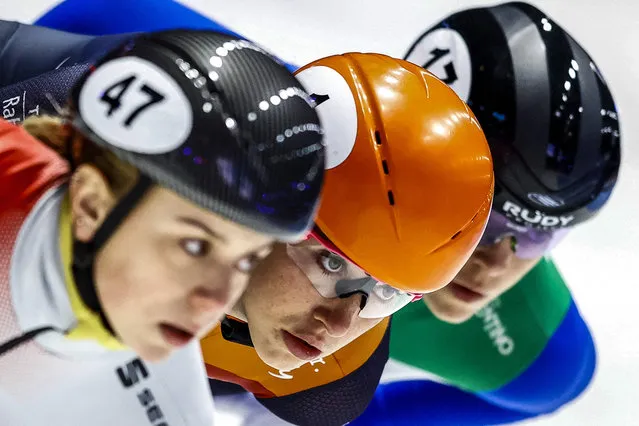 Netherlands' Suzanne Schulting (C) is flanked by Hungary's Zsofia Konya (L) and Italy's Arianna Fontana in the heats 1000 meters meters during the ISU World Short Track Speed Skating Championships at the Sportboulevard in Dordrecht on March 5, 2021. (Photo by Vincent Jannink/ANP/AFP Photo)