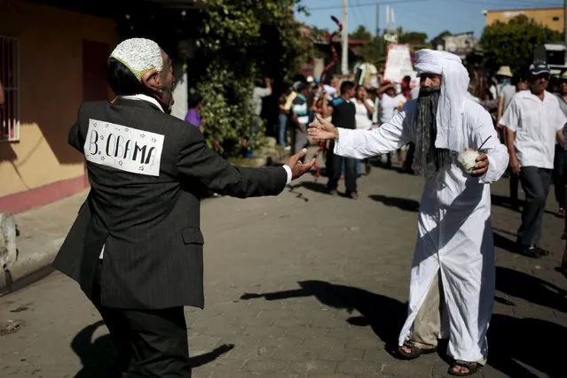Men dressed as U.S. President Barack Obama (L) and Taliban take part in a festival to honor San Silvestre, in the town of Catarina, Nicaragua January 1, 2016. (Photo by Oswaldo Rivas/Reuters)
