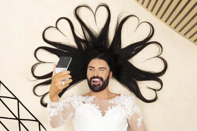 Rylan Clark, the BBC Radio 2 presenter, in the last decade of July 2023 recreates the model Kendall Jenner’s heart hair shot to mark the launch of the Samsung Selfie Competition, which offers a prize of £500,000. The picture of Jenner became Instagram’s most liked selfie of 2015. (Photo by David Parry/PA Wire Press Association)