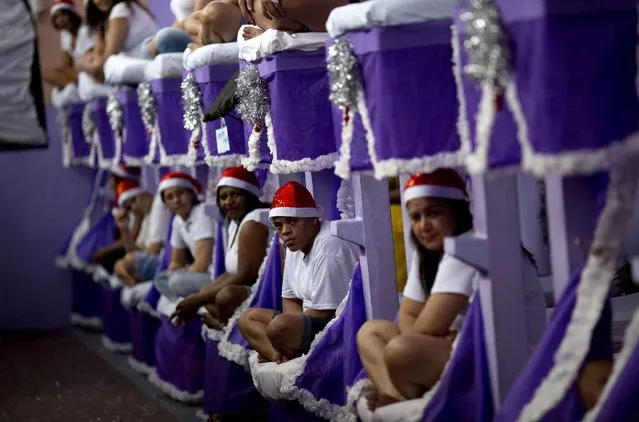 Prisoners perform in a play as part of the 7th annual Nelson Hungria prison’s Christmas event that also includes a cell decorating contest, in Rio de Janeiro, Brazil, Thursday, December 15, 2016. (Photo by Silvia Izquierdo/AP Photo)