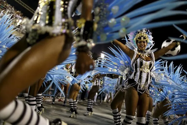 Revellers of Grande Rio samba school perform during the carnival parade at the Sambadrome in Rio de Janeiro, February 8, 2016. (Photo by Pilar Olivares/Reuters)