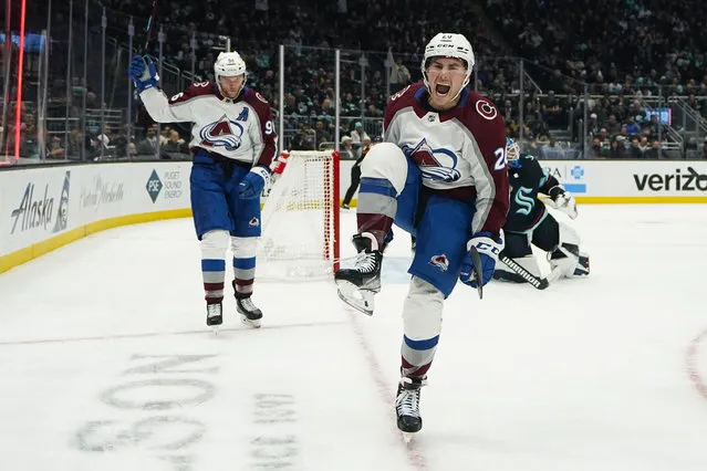 Colorado Avalanche center Ross Colton, right, reacts after scoring against the Seattle Kraken as teammate Mikko Rantanen, left, skates over to join him during the second period of an NHL hockey game Monday, November 13, 2023, in Seattle. (Photo by Lindsey Wasson/AP Photo)