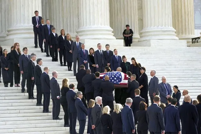 The flag-draped casket of retired Supreme Court Justice Sandra Day O'Connor arrives at the Supreme Court in Washington, Monday, December 18, 2023. O'Connor, an Arizona native and the first woman to serve on the nation's highest court, died Dec. 1 at age 93. (Photo by J. Scott Applewhite/AP Photo)