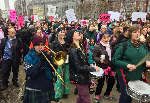 Protesters gather for the Women's March on Philadelphia a day after Republican Donald Trump's inauguration as president, Saturday, January 21, 2017 in Philadelphia. The march is being held in solidarity with similar events taking place in Washington and around the nation. (Photo by Jacqueline Larma/AP Photo)