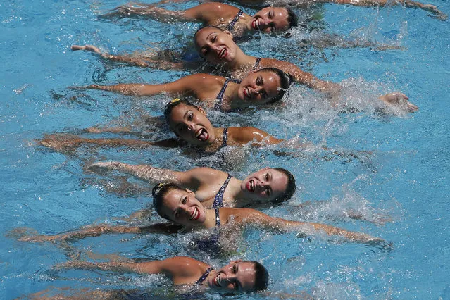 France's team performs their Free Routine during the Synchronized Swimming Olympic Games Qualification Tournament at the Maria Lenk Aquatics Center in Rio de Janeiro, Brazil on March 6, 2016. The tournament is also a test event for the Rio 2016 Olympics. (Photo by Felipe Dana/AP Photo)