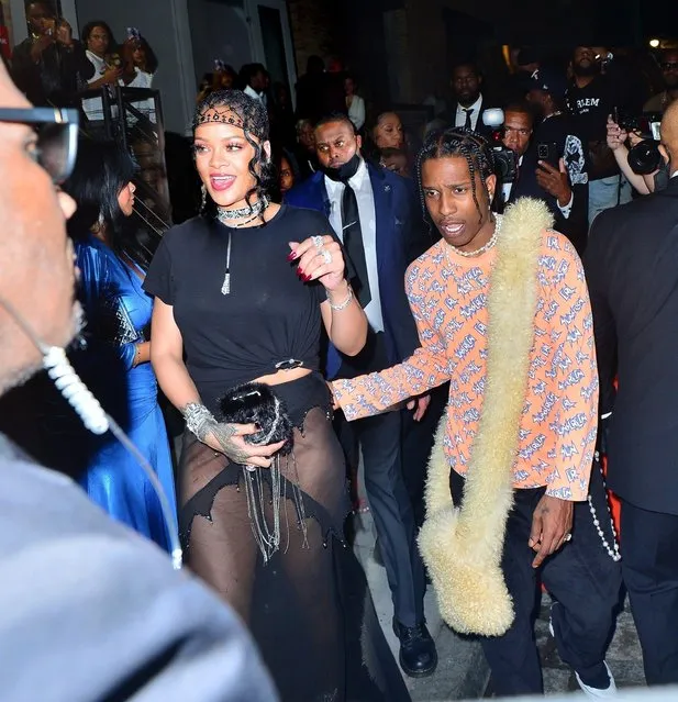 Rihanna and beau A$AP Rocky hold hands as they leave her Met Gala after-party at Davide in New York on September 14, 2021. (Photo by Backgrid USA)