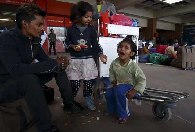 A girl cries as her family takes refuge at Tribhuvan International Airport after an earthquake in Kathmandu, Nepal April 28, 2015. (Photo by Navesh Chitrakar/Reuters)