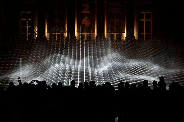 An artistic light mapping is seen during the Bright Festival in Brussels, Belgium on February 17, 2024. (Photo by Yves Herman/Reuters)