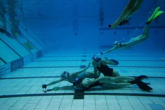 Originally called “octopush,” underwater hockey was invented back in 1954 by four English divers looking to stay fit during the winter months, when it was too cold to dive the North Sea. The goal is similar to traditional hockey: score by pushing the puck into the other team’s net. (Photo by Sol Neelman)