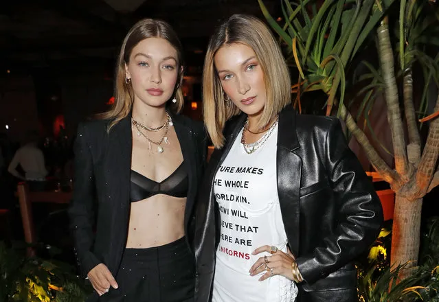 Gigi Hadid and Bella Hadid attend the LOVE & YouTube LFW party supported by Perriet-Jouet and hosted by Katie Grand & Derek Blasberg at Decimo at The Standard, London, on September 16, 2019 in London, England. (Photo by David M. Benett/Dave Benett/Getty Images for LOVE Magazine)
