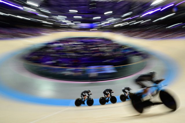 New Zealand's Ally Wollaston, New Zealand's Bryony Botha, New Zealand's Emily Shearman and New Zealand's Nicole Shields compete in a women's track cycling team pursuit first round of the Paris 2024 Olympic Games at the Saint-Quentin-en-Yvelines National Velodrome in Montigny-le-Bretonneux, south-west of Paris, on August 7, 2024. (Photo by John MacDougall/AFP Photo)