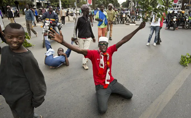 Opposition demonstrators calling for the disbandment of the electoral commission over allegations of bias and corruption, protest in downtown Nairobi, Kenya Monday, June 6, 2016. (Photo by Ben Curtis/AP Photo)