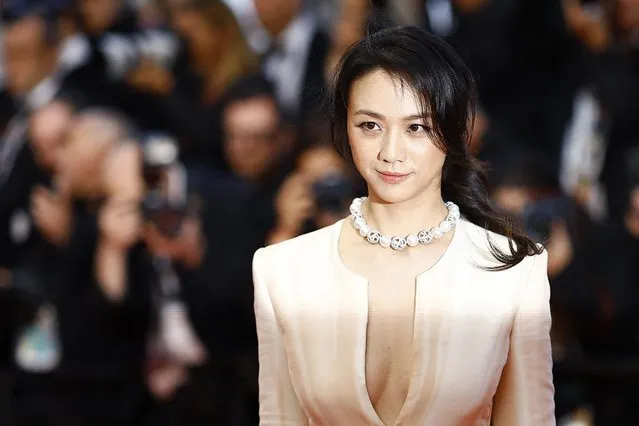 Chinese actress Tang Wei leaves after the screening of the film “Decision to Leave (Heojil Kyolshim)” during the 75th edition of the Cannes Film Festival in Cannes, southern France, on May 23, 2022. (Photo by Stephane Mahe/Reuters)