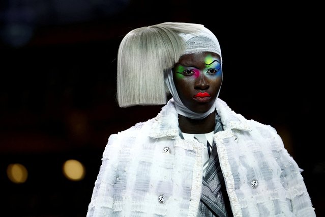 A model presents a creation by designer Thom Browne as part of his Haute Couture Fall/Winter 2023-2024 collection show at the Opera Garnier in Paris, France on July 3, 2023. (Photo by Sarah Meyssonnier/Reuters)