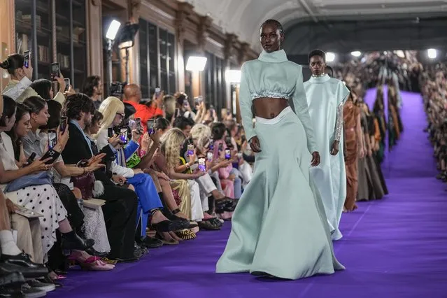 Models wear creations as part of Mabille's Haute Couture Fall/Winter 2022-2023 fashion collection presented Tuesday, July 5, 2022 in Paris. (Photo by Michel Euler/AP Photo)