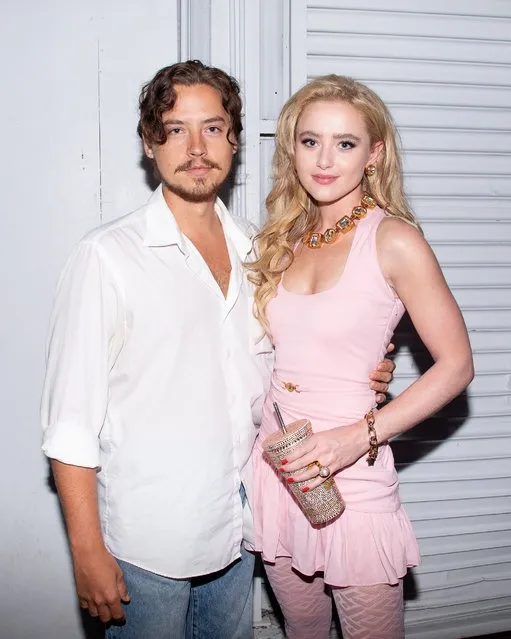 American actor and photographer Cole Sprouse hugs future “Lisa Frankenstein” co-star Kathryn Newton close at the launch of a Versace sneakers collection in Los Angeles on July 27, 2022. (Photo by Sydney Jackson/BFA.com)