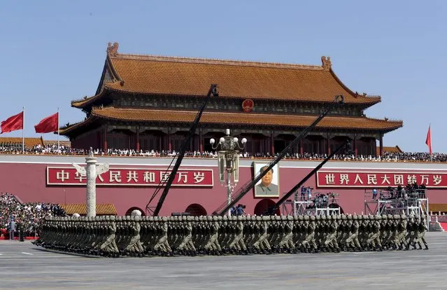Soldiers of China's People's Liberation Army (PLA) march past Tiananmen Gate during the military parade marking the 70th anniversary of the end of World War Two, in Beijing, China, September 3, 2015. (Photo by Jason Lee/Reuters)