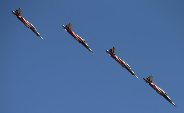 Switzerland's Air Force national flight team Patrouille Suisse performs during an exercise in their Northrop F-5E Tiger II aircrafts near the eastern Swiss town of Niederurnen, September 6, 2013. (Photo by Arnd Wiegmann/Reuters)