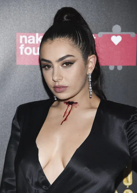 Singer Charli XCX attends the Fabulous Fund Fair, hosted by the Naked Heart Foundation and amfAR, at Skylight Clarkson North on Saturday, October 28, 2017, in New York. (Photo by Evan Agostini/Invision/AP Photo)