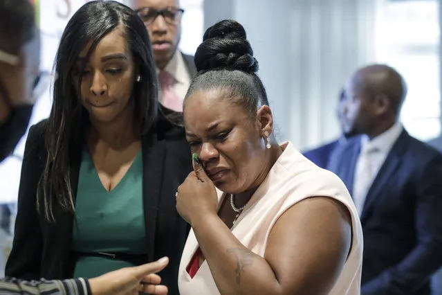 Tomika Miller, center, widow of Rayshard Brooks cries as she leaves a news conference, Wednesday, June 17, 2020 in Atlanta. Fulton County District Attorney Paul L. Howard Jr. announced former Atlanta Police Officer Garrett Rolfe faces charges including felony murder in the fatal shooting of Rayshard Brooks on June 12. (Photo by Brynn Anderson/AP Photo)