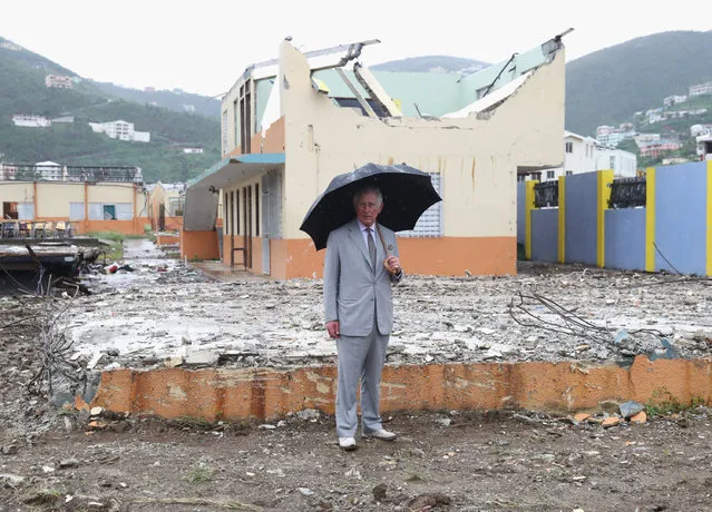 Prince Charles, Prince of Wales view the destroyed landscape left by the hurricane on November 18, 2017 in Antigua and Barbuda. The Prince of Wales is on a three day visit to the Caribbean to visit residents of a number of Islands who have been affected by the devastating hurricanes of Septmeber. (Photo by Chris Jackson/Getty Images)