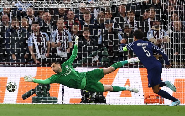 Paris Saint-Germain's Italian goalkeeper #99 Gianluigi Donnarumma jumps for the ball during the UEFA Champions League quarter-final second-leg football match between Aston Villa and Paris Saint-Germain at Villa Park in Birmingham, central England on April 15, 2025. (Photo by Franck Fife/AFP Photo)