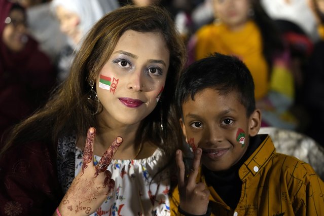 Supporters of Muttahida Qaumi Movement of Pakistan, celebrate victory of a candidate from their party in the parliamentary elections, in Karachi, Pakistan, Sunday, February 11, 2024. (Photo by Fareed Khan/AP Photo)