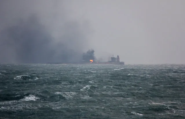 Smoke is seen from Panama-registered Sanchi tanker carrying Iranian oil that caught ablaze after it collided with a Chinese freight ship in the East China Sea, in this January 9, 2018 handout picture released by China's Ministry of Transport. (Photo by Reuters/China's Ministry of Transport)