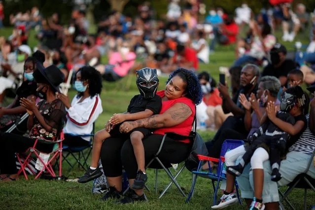 Kaleb Murray, 4, and his mother, Jasmine Pearson attend a community celebration for late actor Chadwick Boseman in his hometown of Anderson, South Carolina, U.S. September 3, 2020. (Photo by Chris Aluka Berry/Reuters)