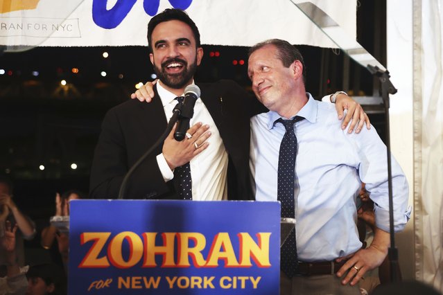 Democratic mayoral candidate Zohran Mamdani, left, speaks on stage with fellow candidate Comptroller Brad Lander at his primary election party, Wednesday, June 25, 2025, in New York. (Photo by Heather Khalifa/AP Photo)