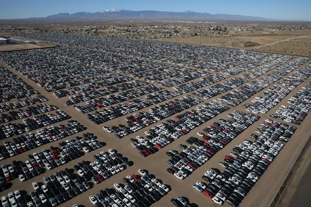 Reacquired Volkswagen and Audi diesel cars sit in a desert graveyard near Victorville, California, March 28, 2018. The court filing said through Dec. 31 Volkswagen had reacquired 335,000 diesel vehicles, resold 13,000 and destroyed about 28,000 vehicles. As of the end of last year, VW was storing 294,000 vehicles around the country. (Photo by Lucy Nicholson/Reuters)