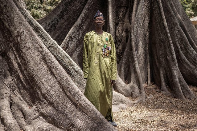 Oumar Dieme, 91, an old Senegalese Tirailleur (Rifleman) poses for a portrait in Badiana on May 14, 2024. Oumar Dieme has been invite to take part in carrying the Olympic flame through France ahead of the opening of the Olympic Games 2024 The French “Tirailleurs sénégalais” corps, created under the Second Empire (1852-1870) and disbanded in the 1960s, brought together soldiers from the former African colonies. The term refers to all African soldiers who fought under the French flag. (Photo by John Wessels/AFP Photo)