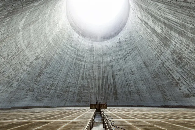 “Event Horizon”. The view inside an enormous inactive cooling tower, France. (Photo and caption by Reginald Van de Velde/National Geographic Traveler Photo Contest)