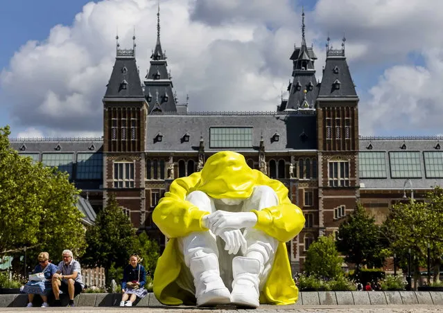 The Silent Struggle artwork is on display on Museumplein square in Amsterdam, Netherlands, 12 July 2023. The sculpture aims to symbolizes the inner struggle of many young people with depression. With the artwork, which will be shown in a number of cities in the near future, initiator Power of Art House draws attention to depression and suicide among young people. (Photo by Remko de Waal/EPA)