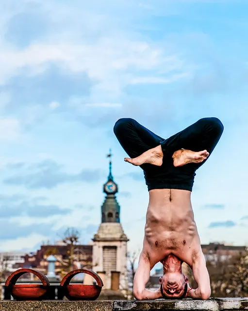 Rooftop yoga in London. (Photo by Kristina Kashtanova/Caters News)