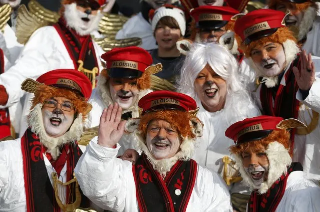 Carnival revellers take part in the traditional Rose Monday carnival parade in the western German city of Duesseldorf February 16, 2015. (Photo by Ina Fassbender/Reuters)