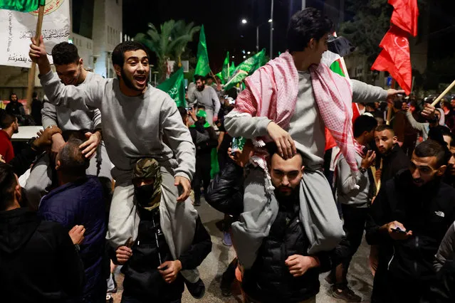 Released Palestinian prisoners react after leaving the Israeli military prison, Ofer, amid a hostages-prisoners swap deal between Hamas and Israel, near Ramallah in the Israeli-occupied West Bank on November 26, 2023. (Photo by Ammar Awad/Reuters)